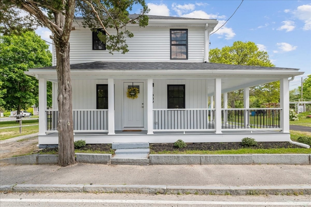 1009 Point Road Marion, MA 02738 - Photo 1 of 31 a view of a house with a porch