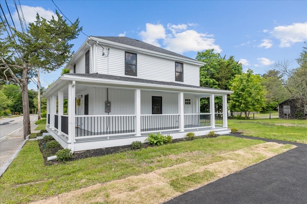 1009 Point Road Marion, MA 02738 - Photo 2 of 31 front view of a house with a yard