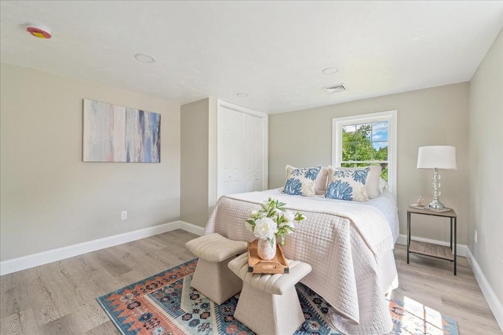 1009 Point Road Marion, MA 02738 - Photo 23 of 31 a living room with furniture and wooden floor