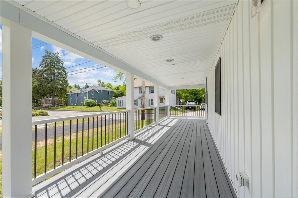 1009 Point Road Marion, MA 02738 - Photo 3 of 31 a view of balcony with wooden floor