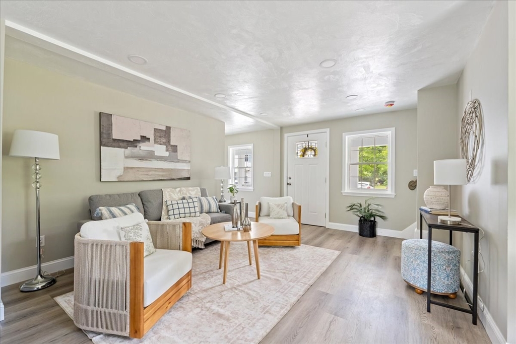 1009 Point Road Marion, MA 02738 - Photo 6 of 31 a living room with furniture and wooden floor