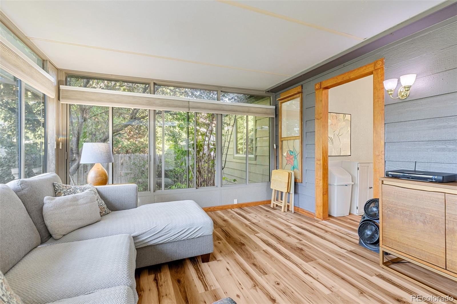 5323 East Sandpiper Avenue Castle Rock, CO 80104 - Photo 17 of 46 a bedroom with furniture and a large window