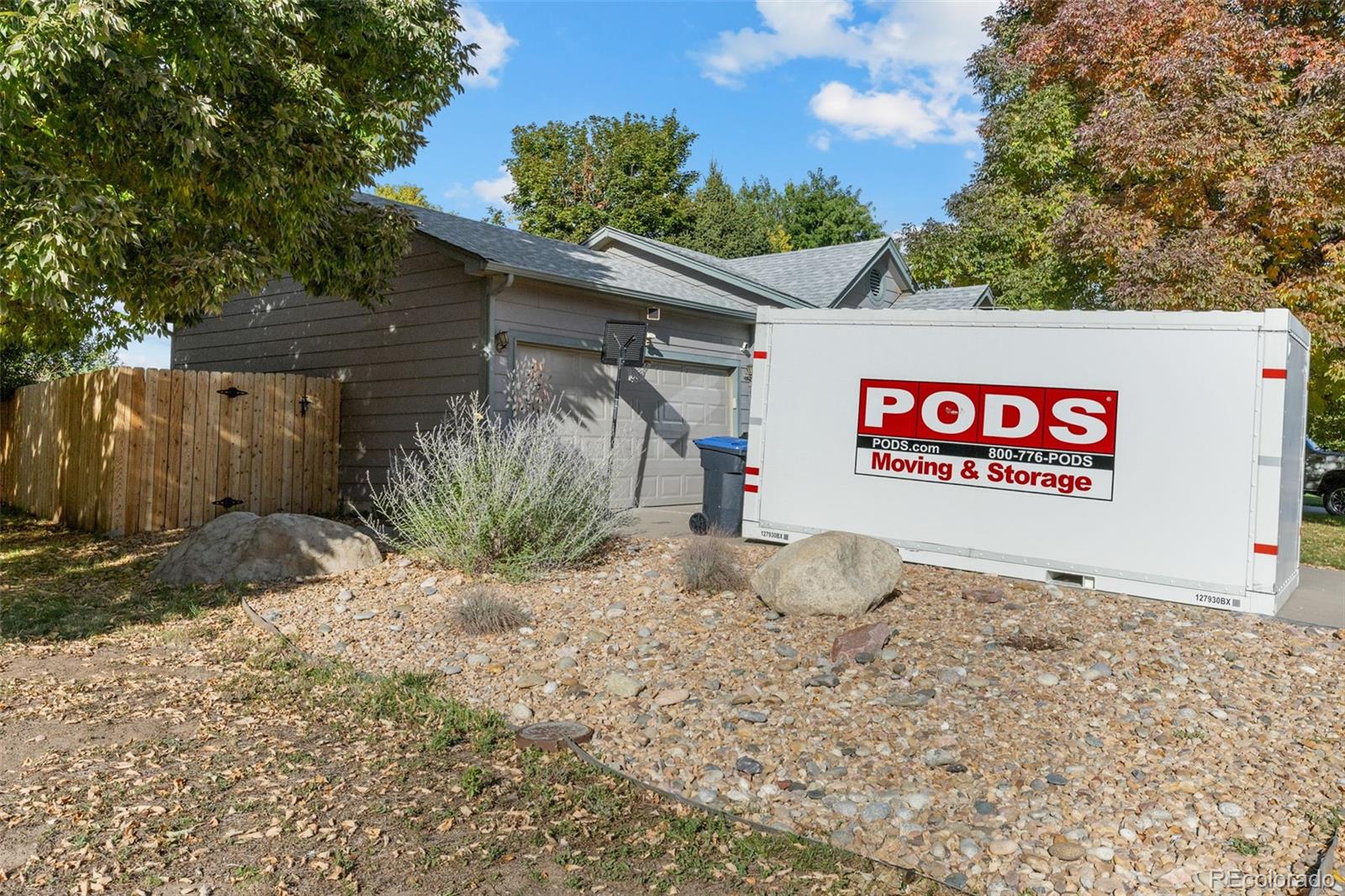 5323 East Sandpiper Avenue Castle Rock, CO 80104 - Photo 4 of 46 a sign that is sitting in front of a tree