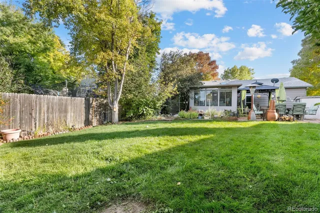 a view of a house with a big yard