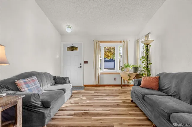 a living room with furniture and a couch