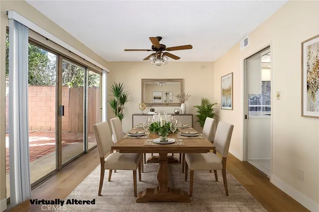 a kitchen with white cabinets and a stove top oven