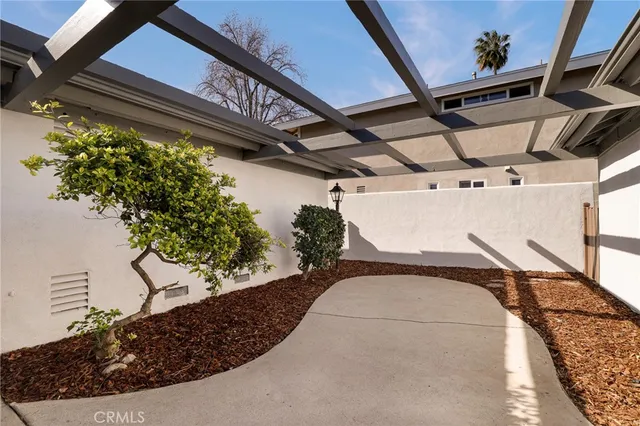 a view of a entryway door with wooden floor