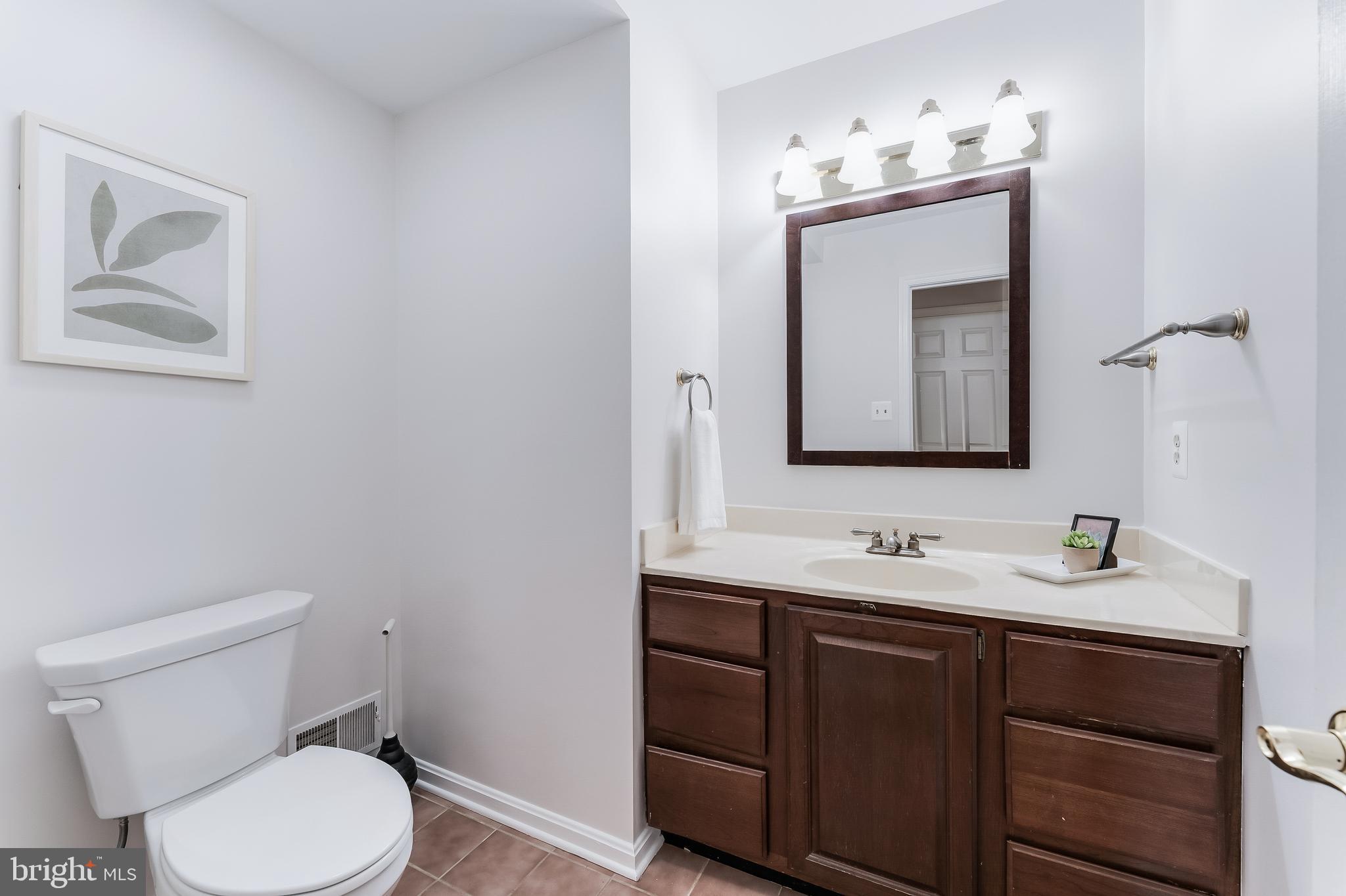 11488 Bingham Terrace Reston, VA 20191 - Photo 30 of 59 Main level half bathroom