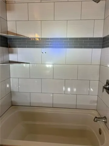 a bathroom with a bathtub