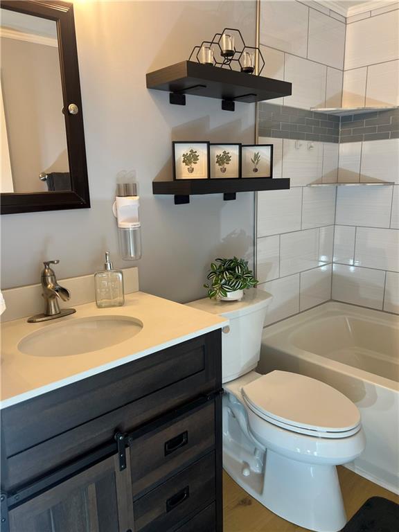 380 Northgate Drive, Unit E Apollo, PA 15613 - Photo 21 of 42 a bathroom with a sink a toilet and mirror