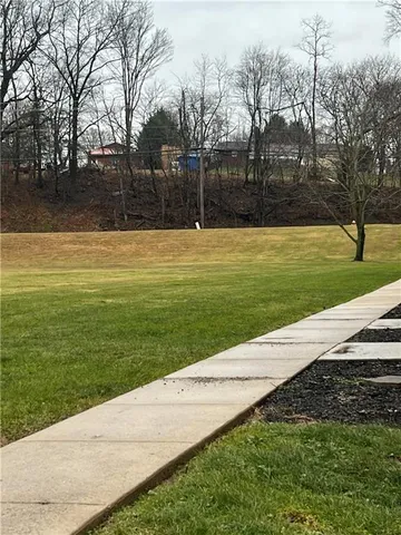 a view of a house with a swimming pool