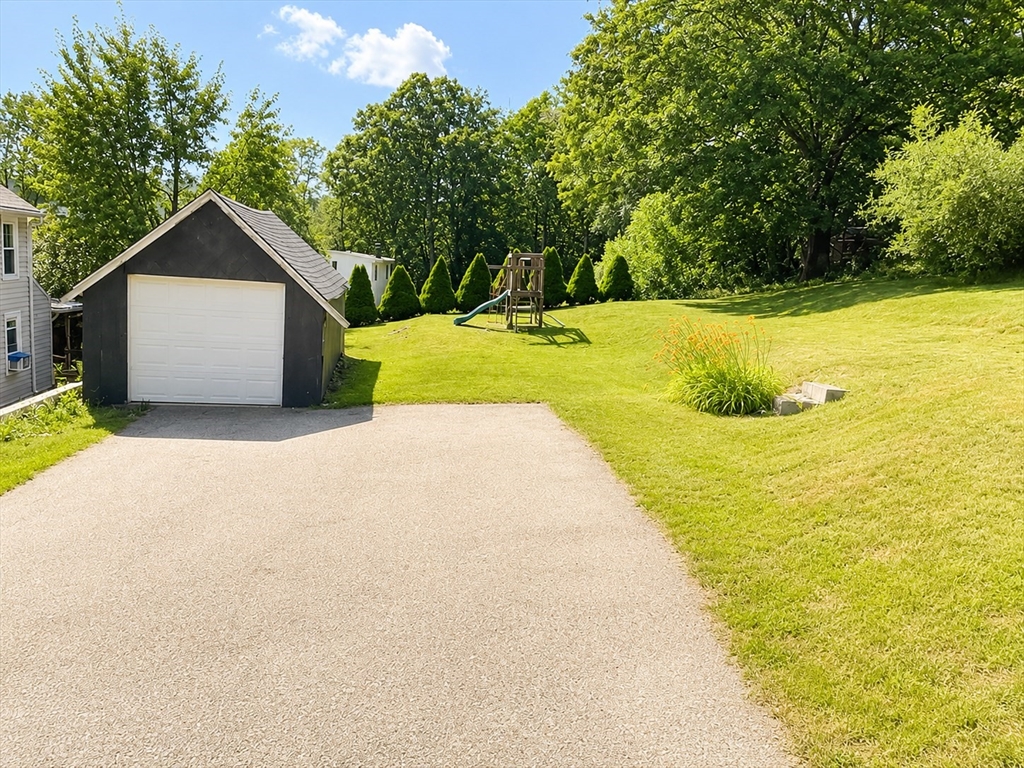 92-94 Sargent Street Leicester, MA 01611 - Photo 25 of 25 a view of house with yard and trees in the background