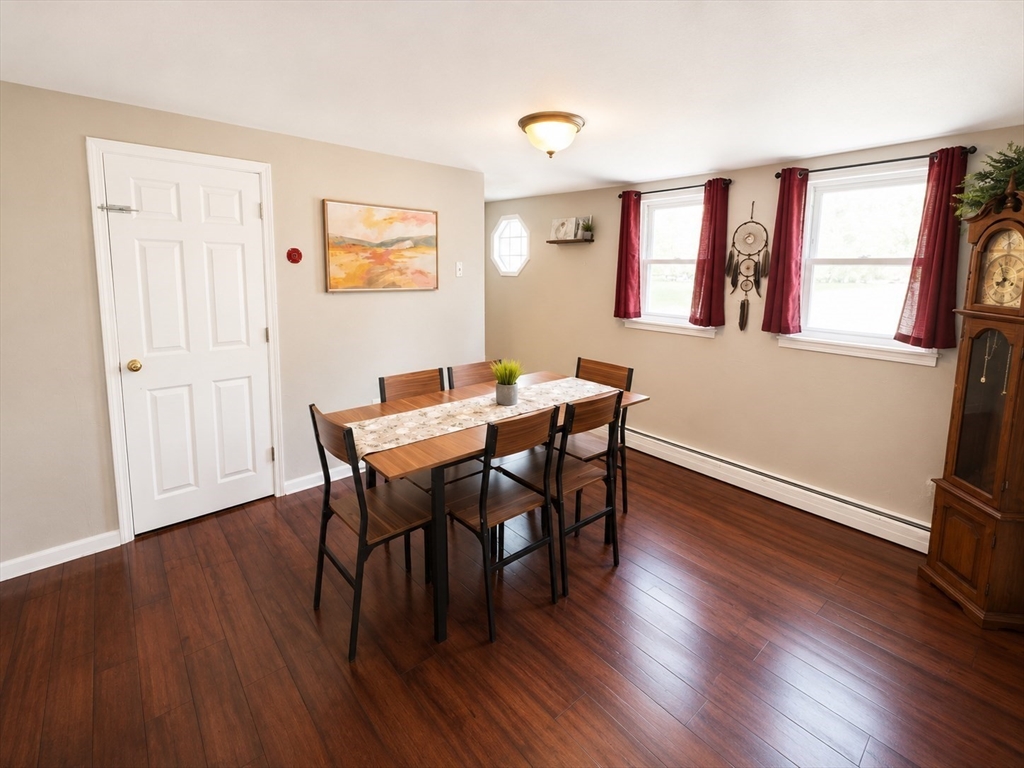 92-94 Sargent Street Leicester, MA 01611 - Photo 3 of 25 a view of a dining room with furniture and wooden floor