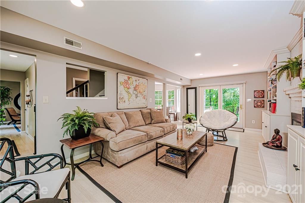 10722 Fairway Ridge Road Charlotte, NC 28277 - Photo 15 of 44 a living room with furniture and a table
