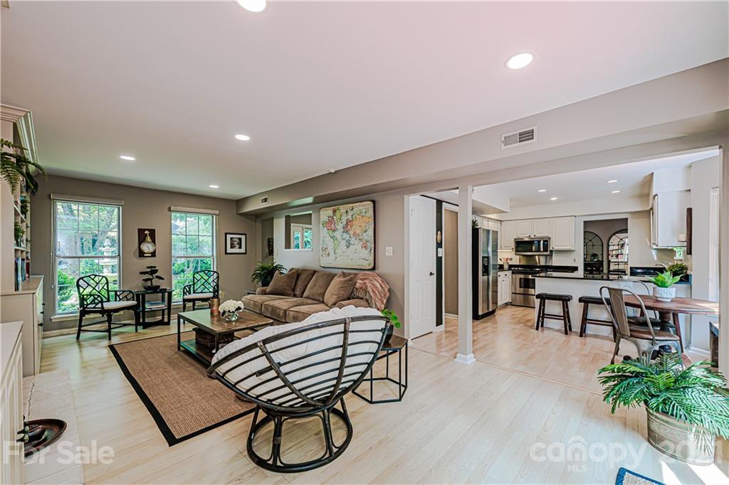 10722 Fairway Ridge Road Charlotte, NC 28277 - Photo 23 of 44 a living room with furniture rug and window