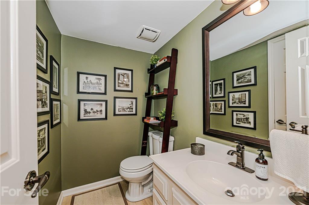 10722 Fairway Ridge Road Charlotte, NC 28277 - Photo 24 of 44 a bathroom with a sink and a mirror