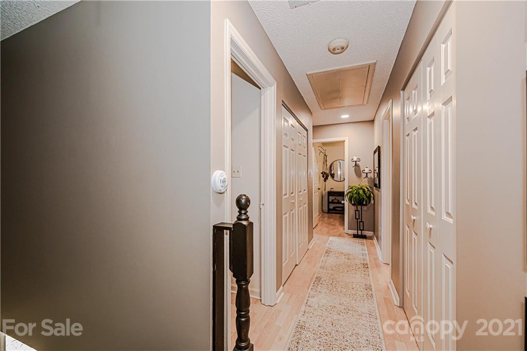 10722 Fairway Ridge Road Charlotte, NC 28277 - Photo 25 of 44 a view of a hallway with a hallway and a livingroom
