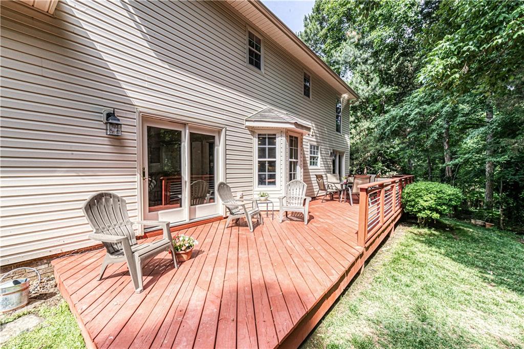 10722 Fairway Ridge Road Charlotte, NC 28277 - Photo 36 of 44 a view of a house with backyard and sitting area