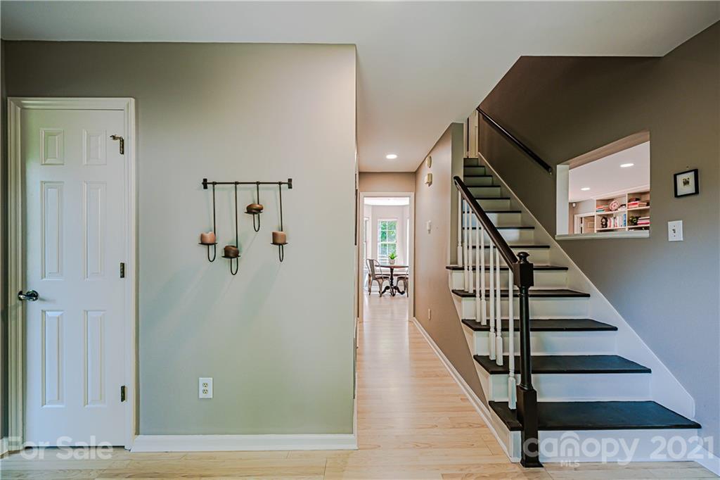10722 Fairway Ridge Road Charlotte, NC 28277 - Photo 5 of 44 a view of a hallway with staircase