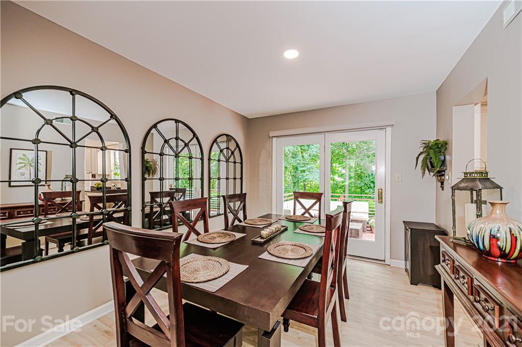 10722 Fairway Ridge Road Charlotte, NC 28277 - Photo 8 of 44 a view of a dining room with furniture window and outside view