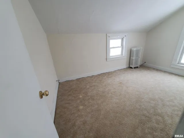 a view of an empty room with window