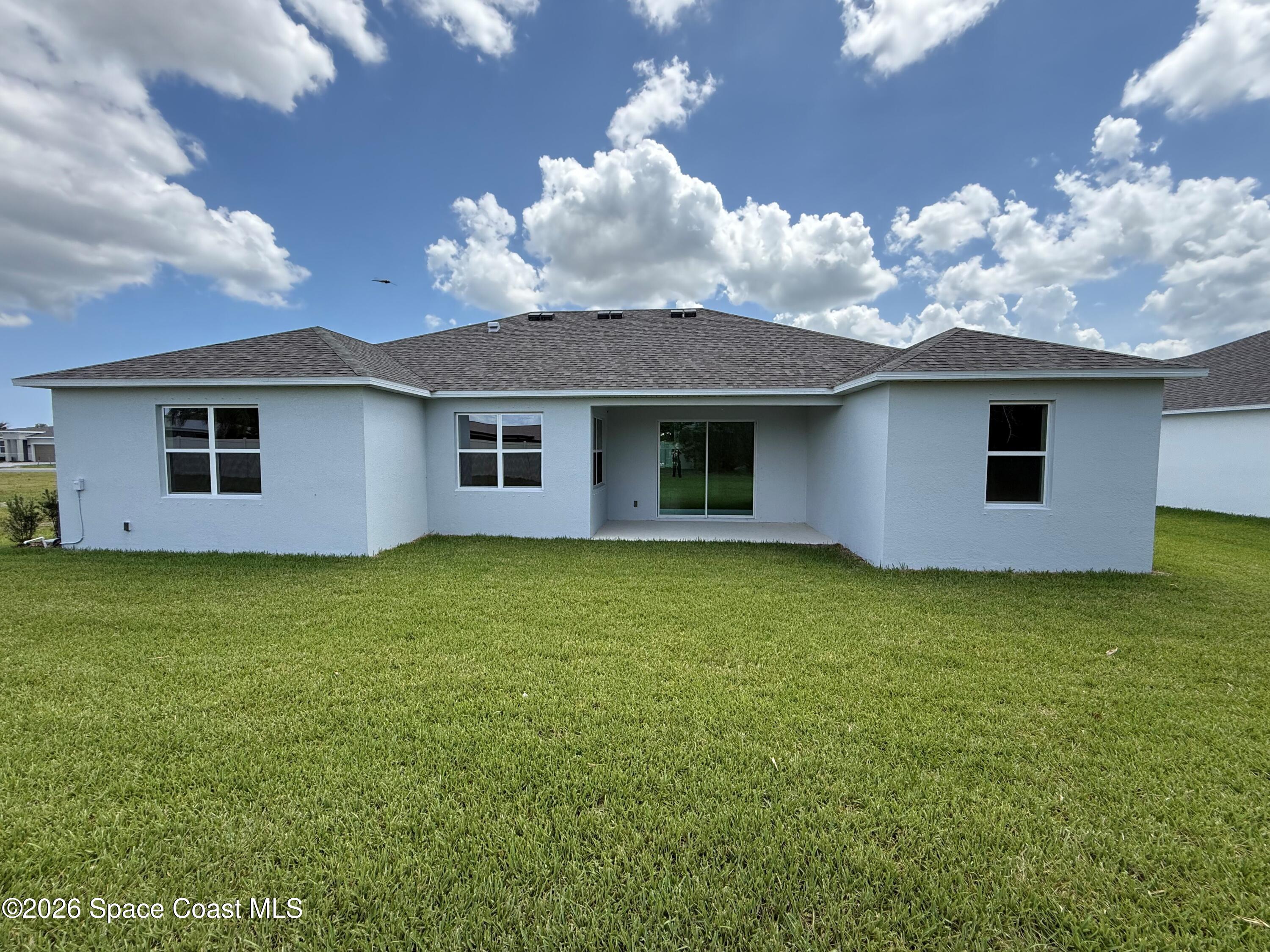 1433 Dunblane Way Northeast Palm Bay, FL 32905 - Photo 4 of 7 Rear Exterior