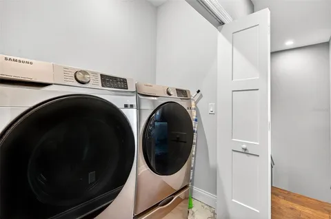 a utility room with dryer and washer