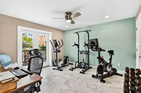 a view of a room with gym equipment