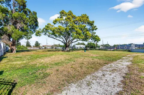 a view of a swimming pool and an outdoor space