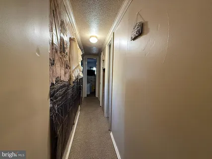 a view of hallway with stairs