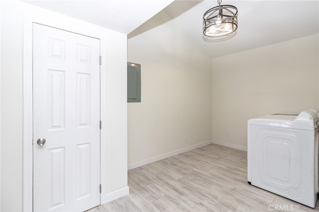 1507 David Drive Needles, CA 92363 - Photo 16 of 44 a view of a storage & utility room with a window