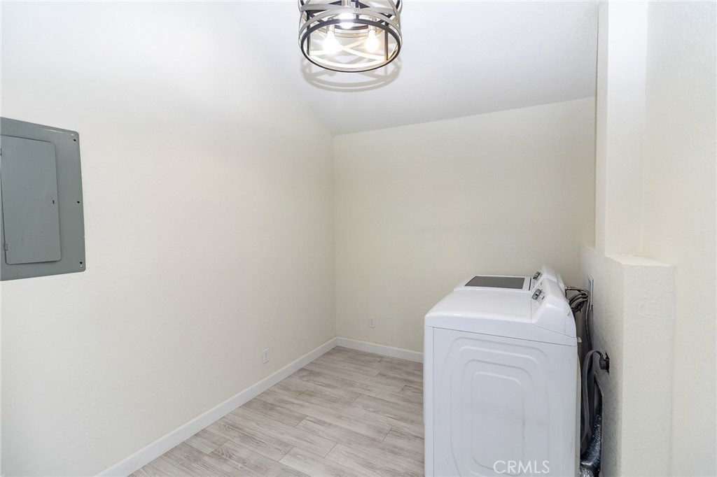 1507 David Drive Needles, CA 92363 - Photo 17 of 44 a utility room with dryer and washer