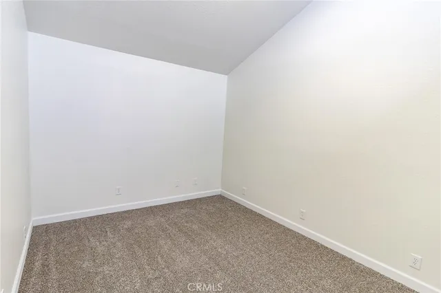 a bathroom with a shower and a sink