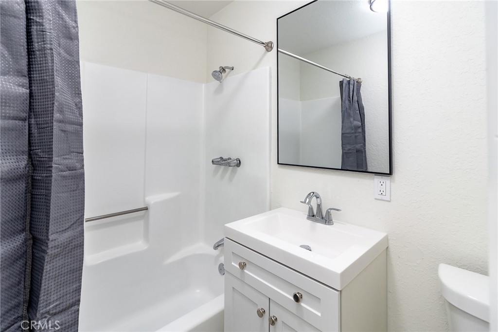 1507 David Drive Needles, CA 92363 - Photo 21 of 44 a bathroom with a sink toilet and shower