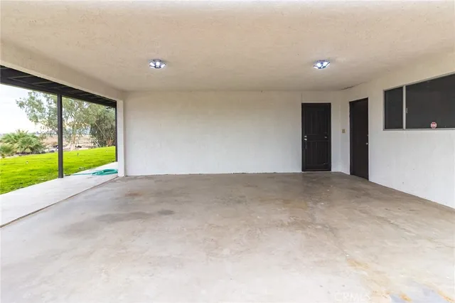 a view of an empty room with a yard