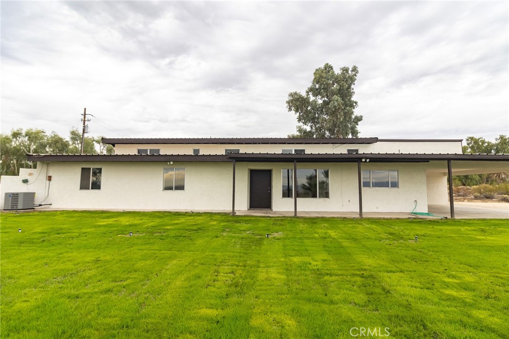1507 David Drive Needles, CA 92363 - Photo 36 of 44 a view of a house with a yard