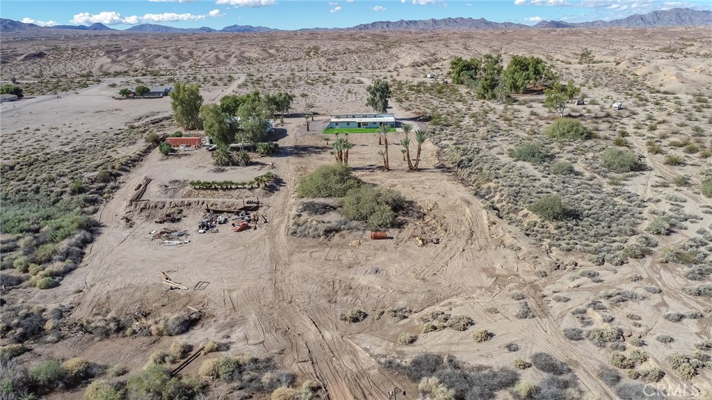 1507 David Drive Needles, CA 92363 - Photo 43 of 44 a view of a dry field with mountains in the background