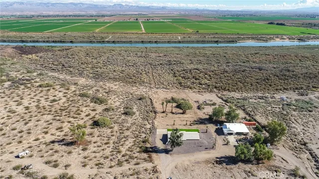 a view of a yard with an outdoor space