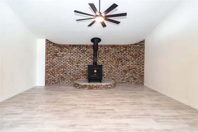 a view of workspace with wooden floor