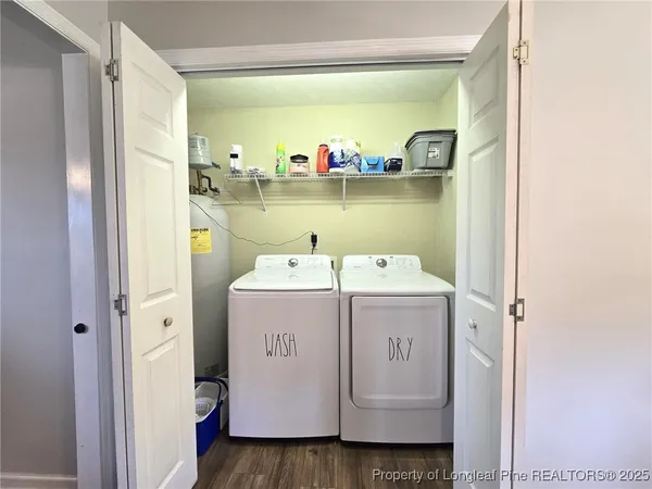a utility room with dryer and washer