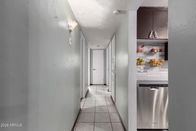 a view of a hallway view with staircase