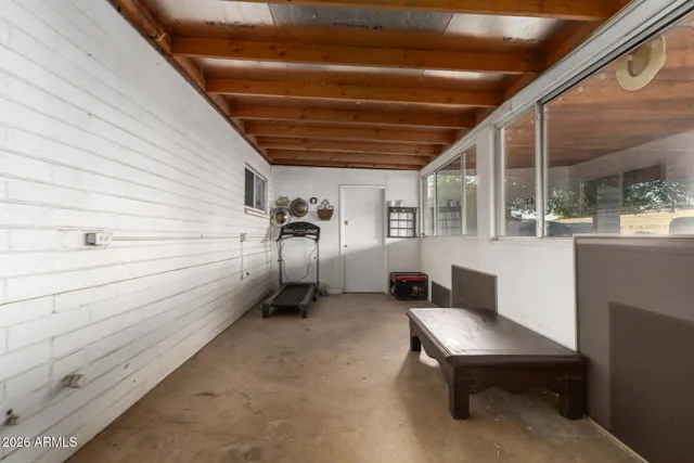 a view of a porch with furniture