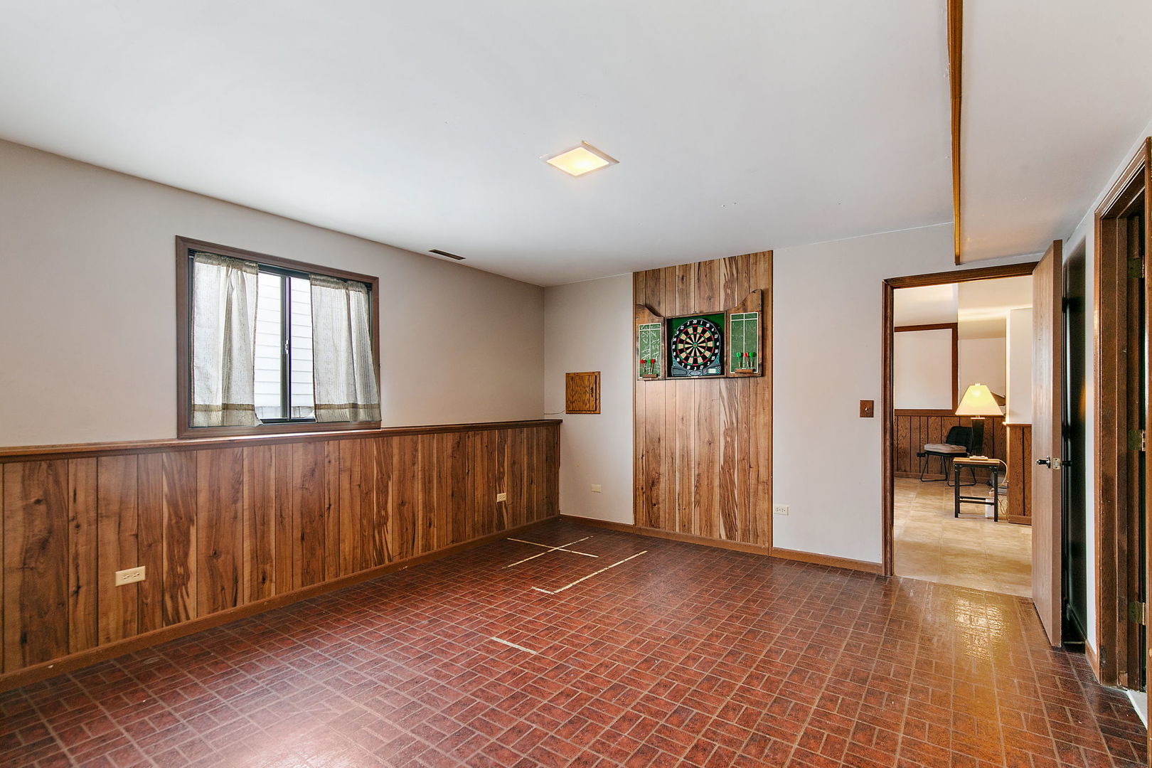 183 Brookside Drive Elgin, IL 60123 - Photo 26 of 46 wooden floor in an empty room with a window