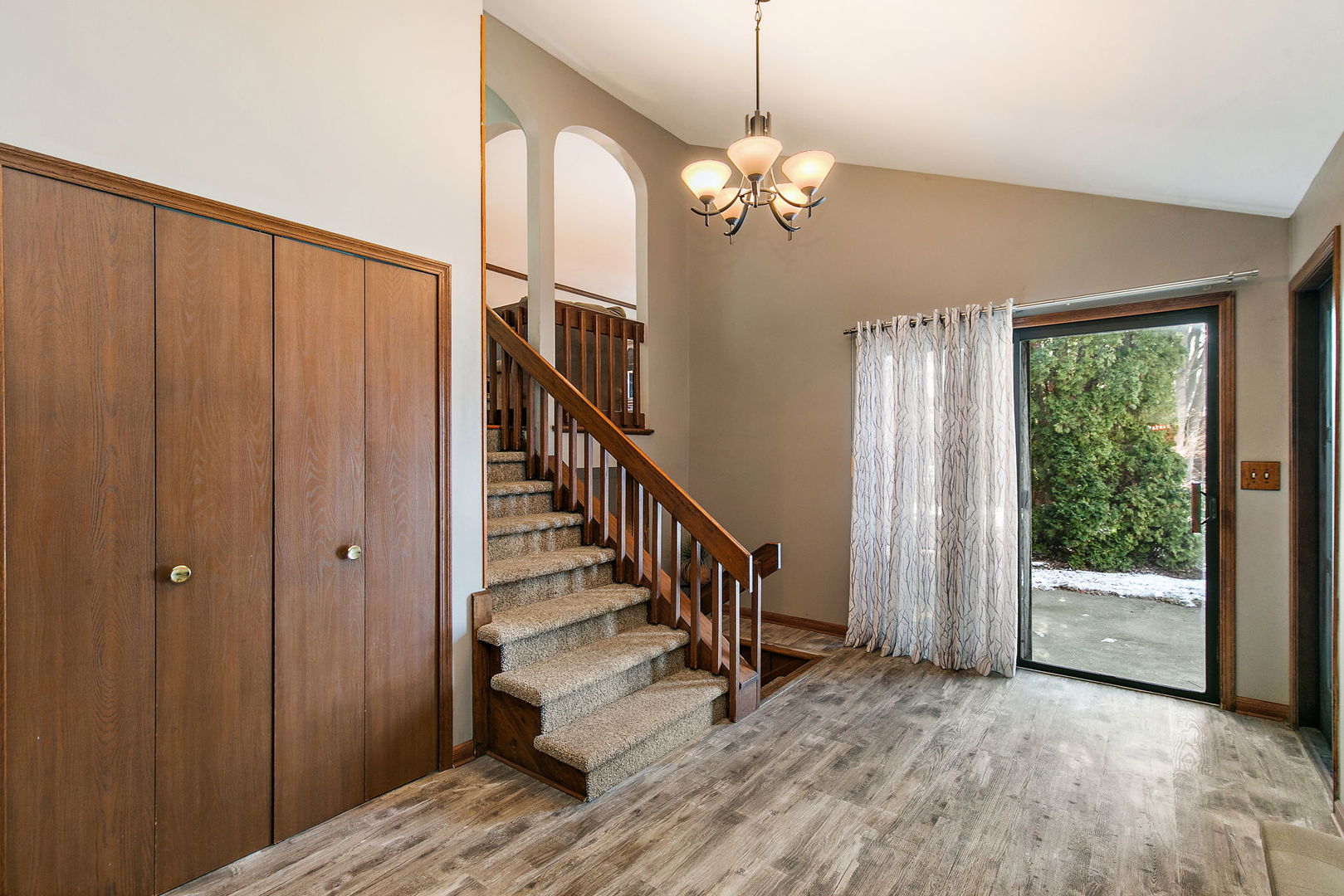 183 Brookside Drive Elgin, IL 60123 - Photo 5 of 46 a view of a room with wooden floor and staircase