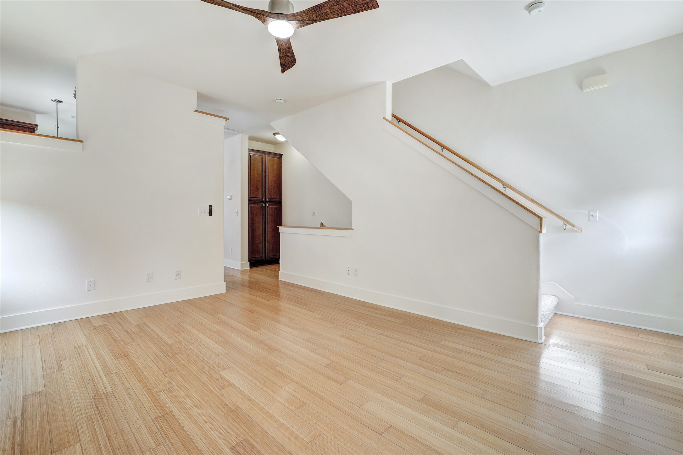 13420 Lyndhurst Street, Unit 208 Austin, TX 78717 - Photo 16 of 40 a view of an empty room with wooden floor
