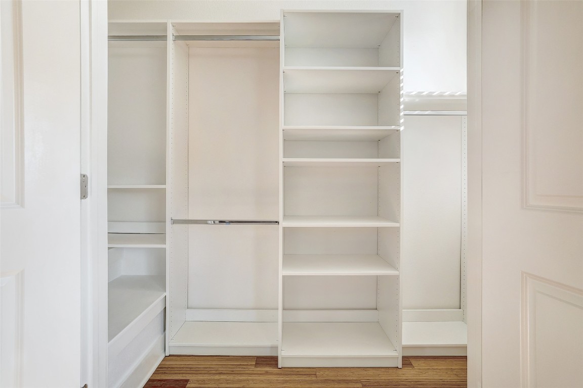 13420 Lyndhurst Street, Unit 208 Austin, TX 78717 - Photo 26 of 40 a view of walk in closet with empty racks
