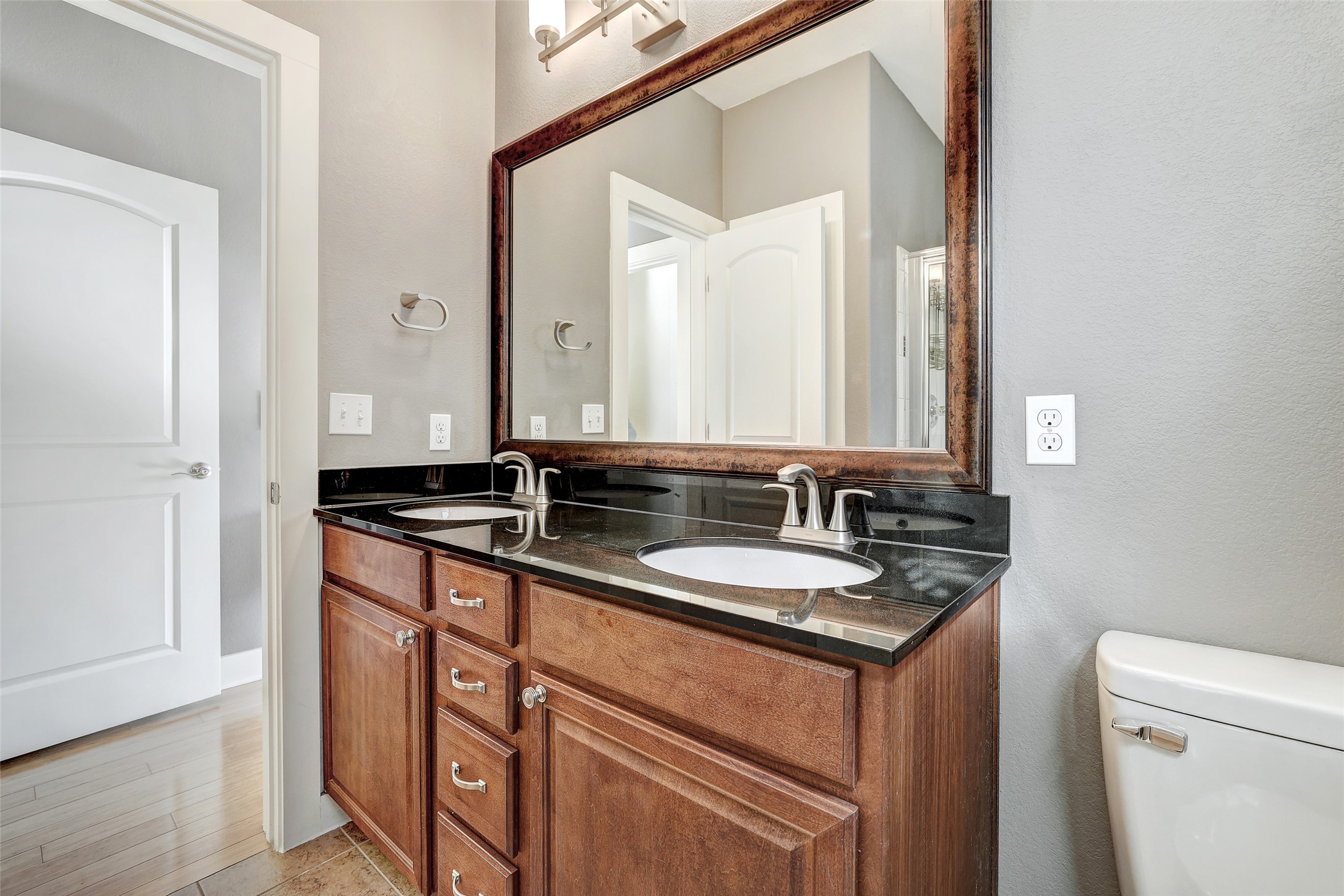 13420 Lyndhurst Street, Unit 208 Austin, TX 78717 - Photo 28 of 40 a bathroom with a sink and a mirror