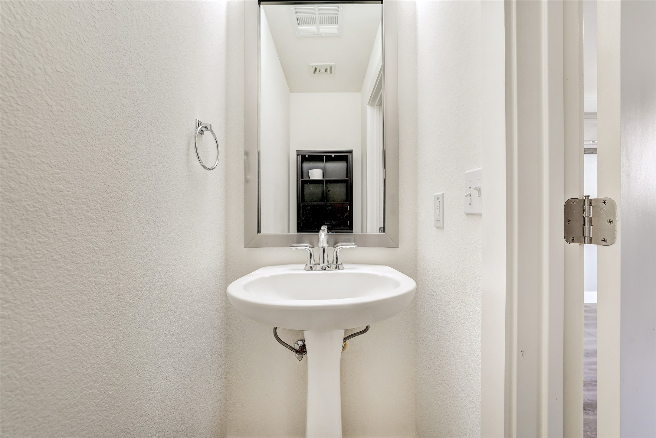 13420 Lyndhurst Street, Unit 208 Austin, TX 78717 - Photo 36 of 40 a bathroom with a sink and a mirror