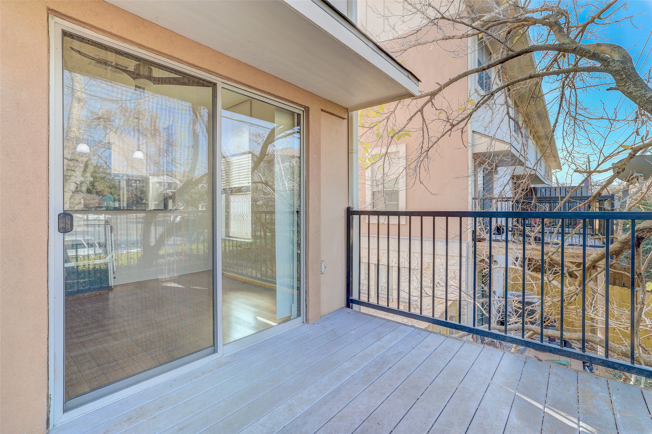 13420 Lyndhurst Street, Unit 208 Austin, TX 78717 - Photo 39 of 40 a view of a glass door with a glass door