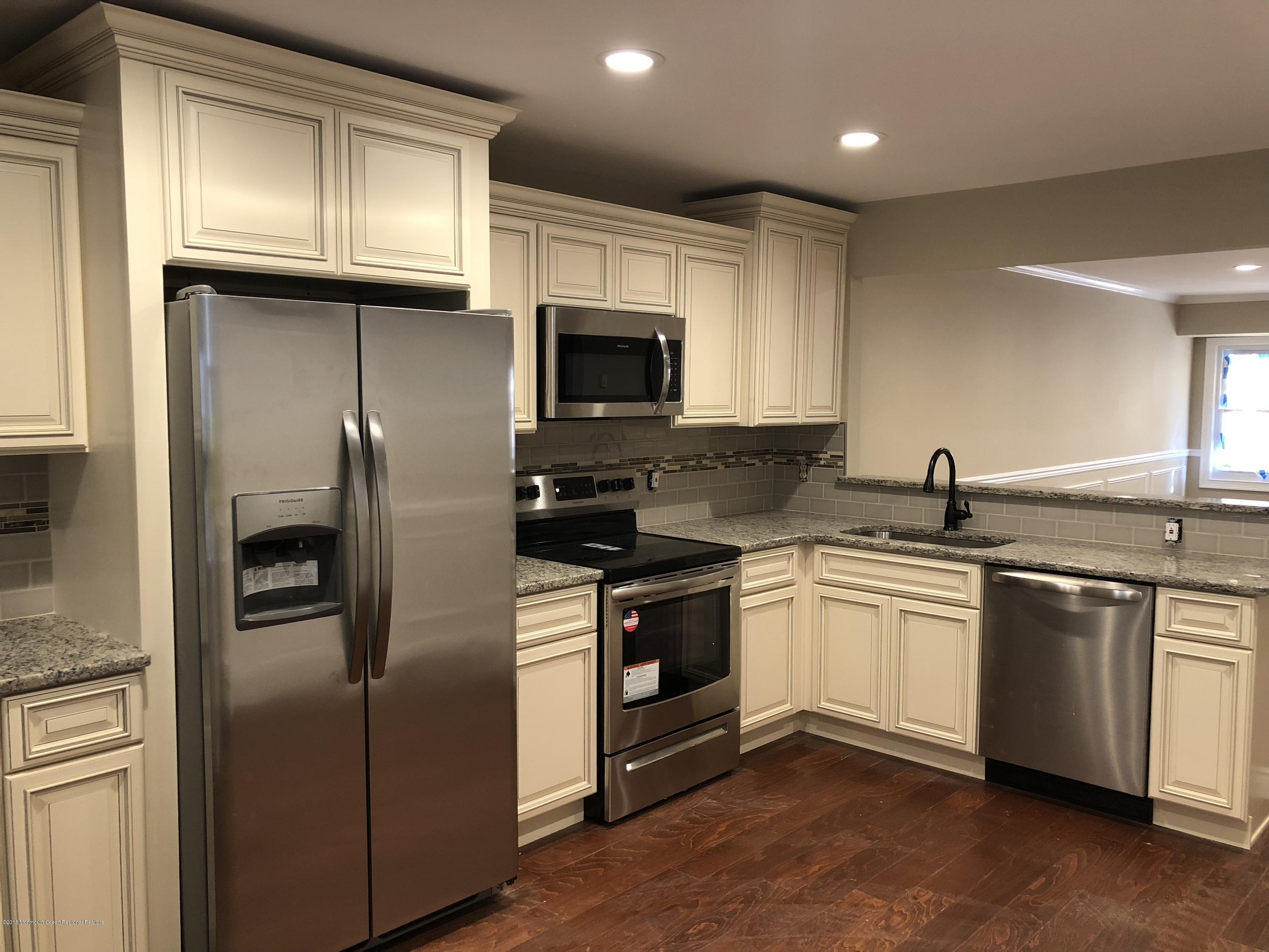 92 East Halls Croft Road, Unit 1000 Freehold, NJ 07728 - Photo 1 of 21 IMG_5440